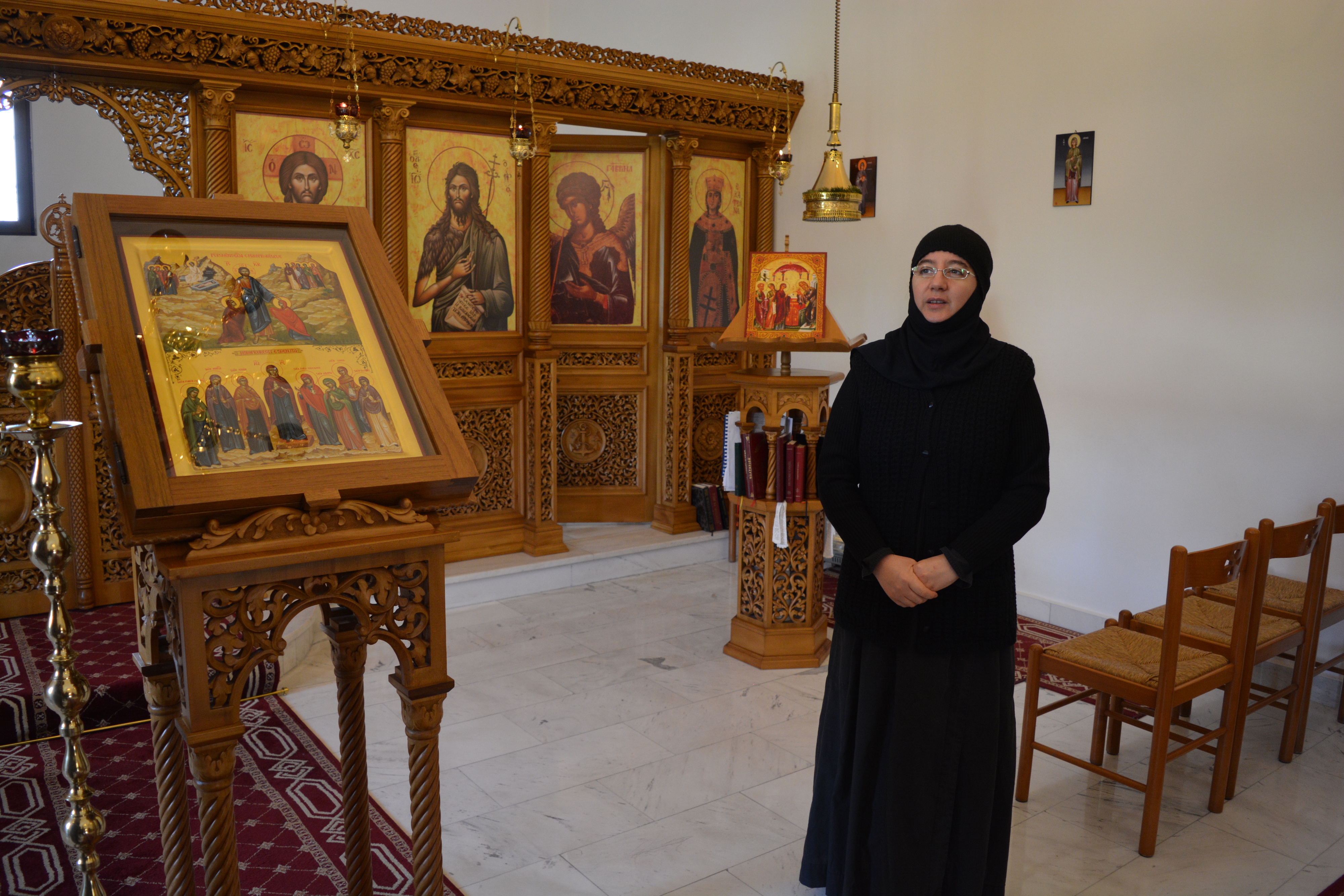 A nun of the monastery, explaining the icon of the holy Myrrhbearers